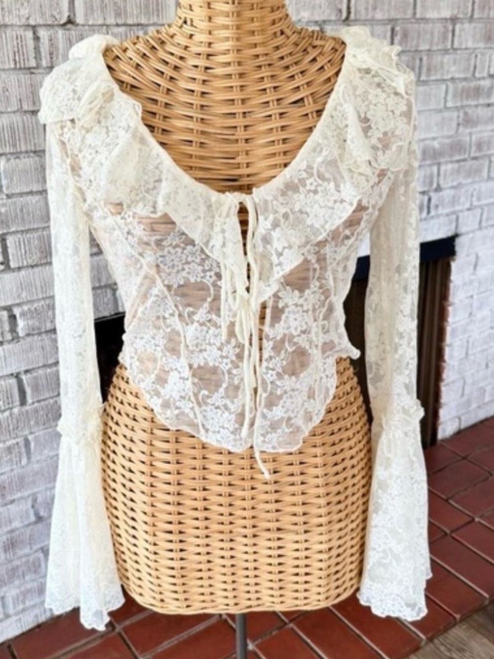 Urban Outfitters “Gossamer Sheer Lace Flyaway White Top”